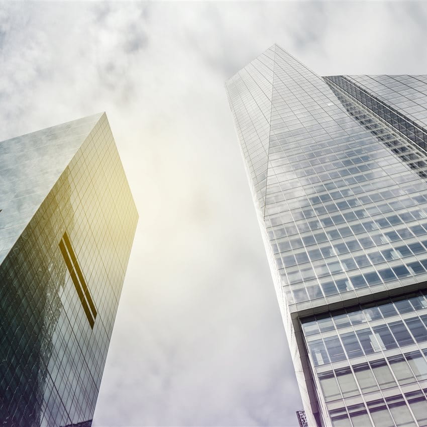 Immobilier USA Gratte-ciel avec ciel et soleil